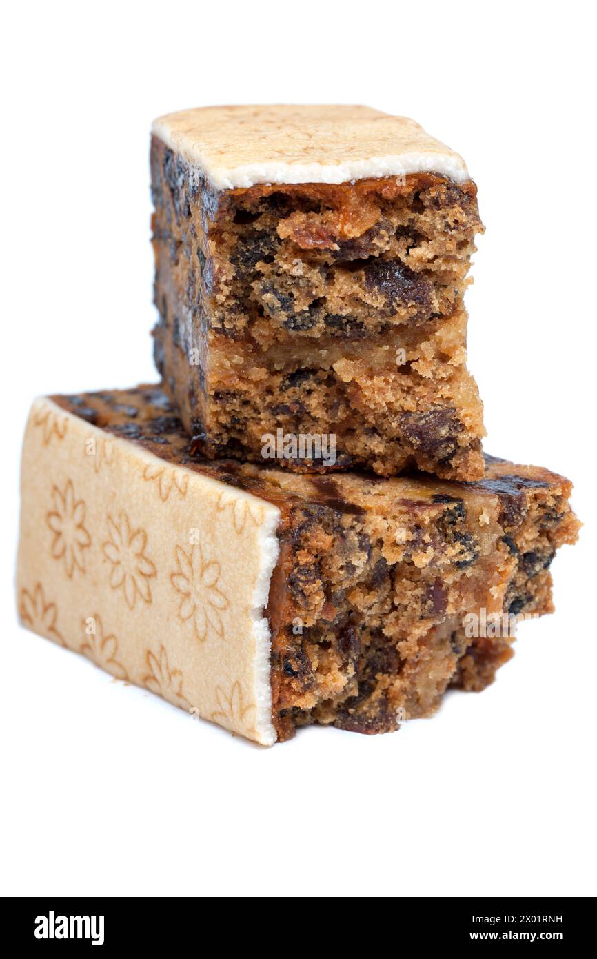 Halved Marks and Spencer Easter Simnel Cake on a White Background Stock Photo