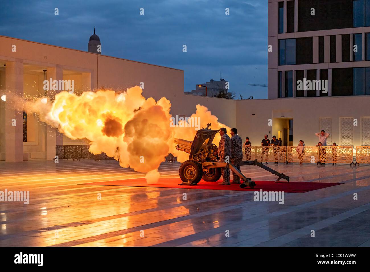 Msheireb Downtown Cannon firing, cannon shooting also known as Midfaa Stock Photo