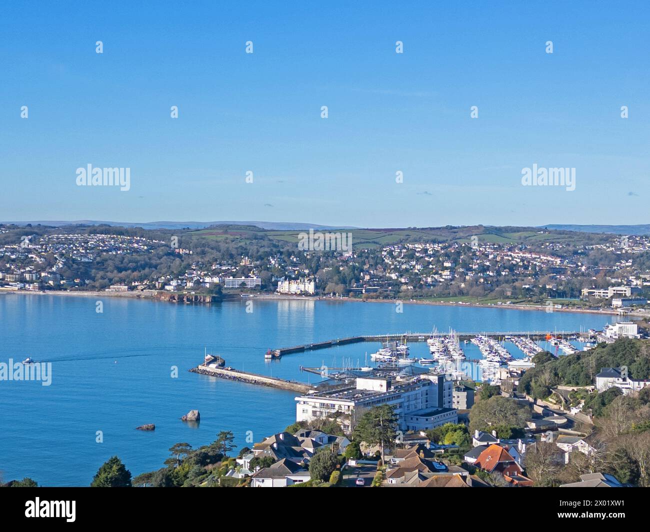 An aerial drone photograph of Torquay showing the harbour and Torre Abbey Sands in the heart of Torbay known as the English Riviera. Stock Photo