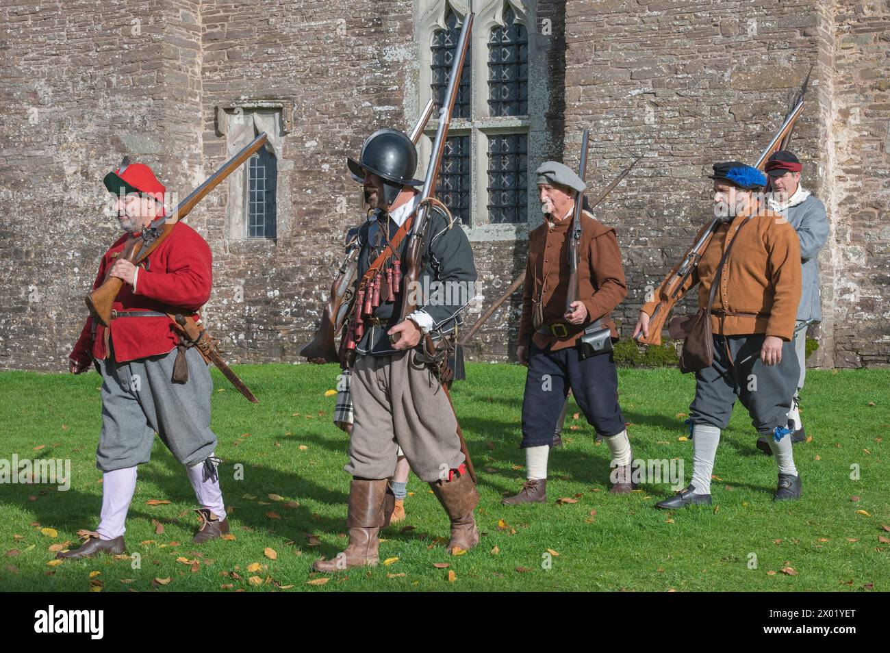 Enactors demonstrating their military drills on a Meet the Marchers day at Tretower Court and Castle, Tretower, Powys, Wales, UK. Stock Photo