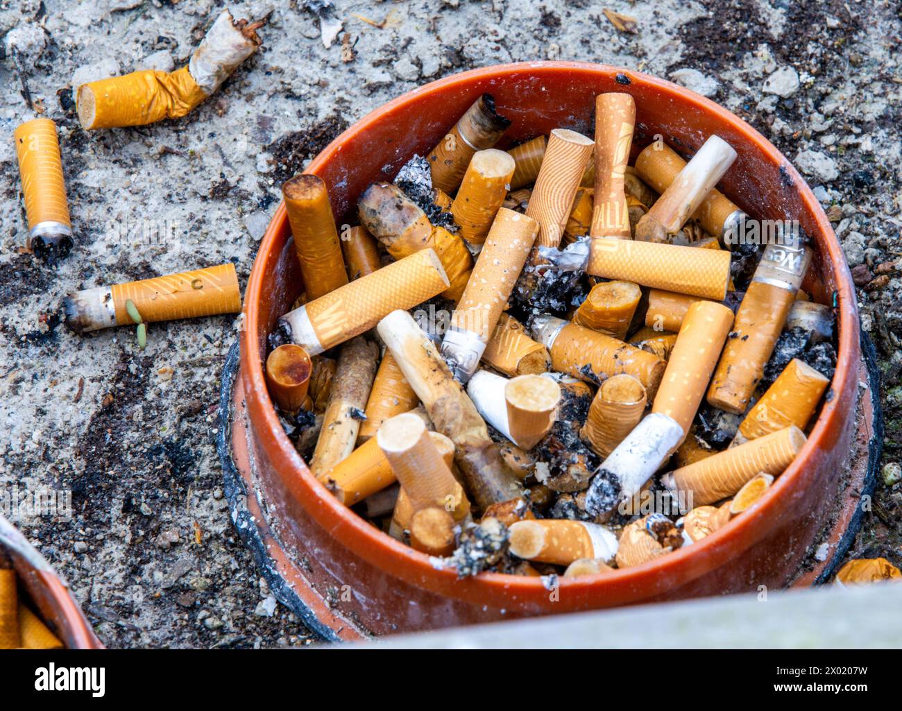 Used cigarettes in ashtray hi-res stock photography and images