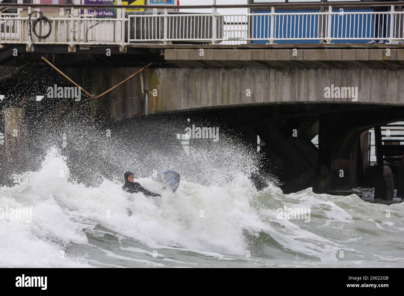 Bournemouth Dorset, UK. 9th Apr, 2024. UK WEATHER Surfers ride the waves at Bournemouth beach on the swell from Storm Kathleen Bournemouth UK Credit: Ian Davidson/Alamy Live News Stock Photo