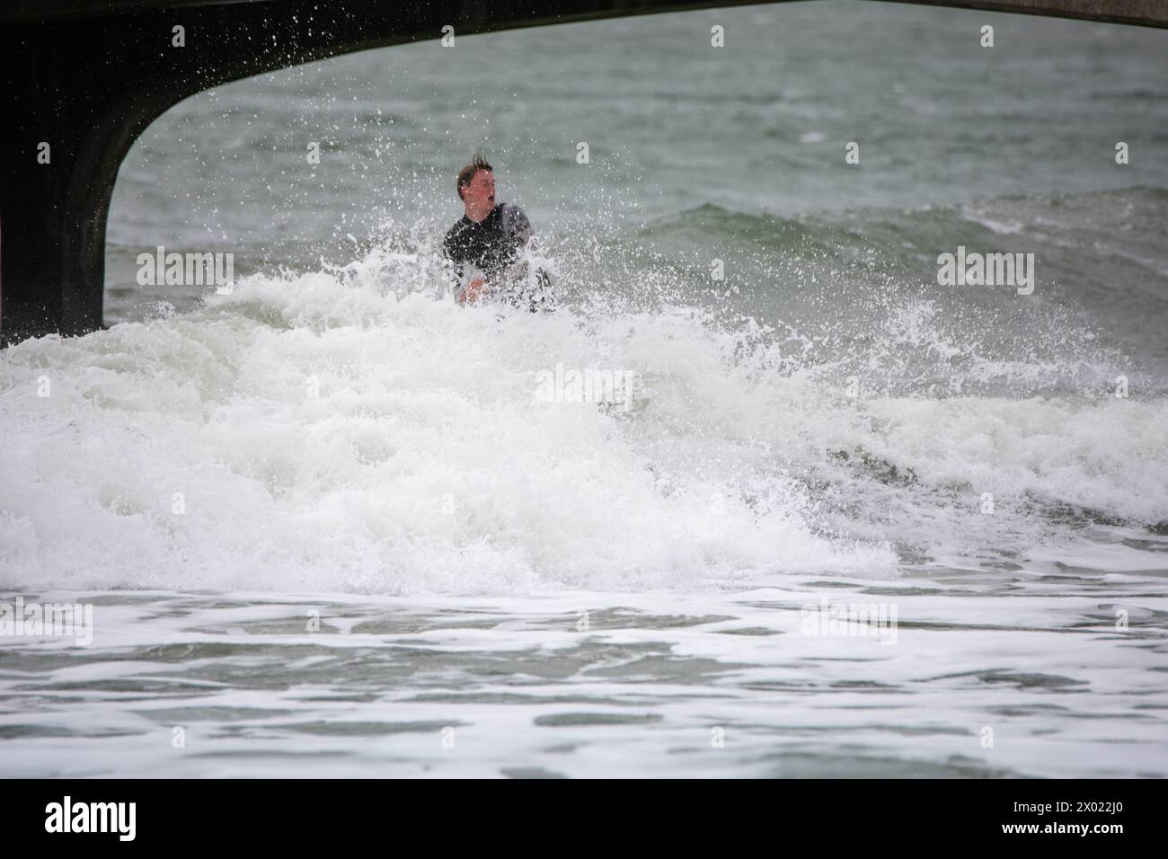 Bournemouth Dorset, UK. 9th Apr, 2024. UK WEATHER Surfers ride the waves at Bournemouth beach on the swell from Storm Kathleen Bournemouth UK Credit: Ian Davidson/Alamy Live News Stock Photo