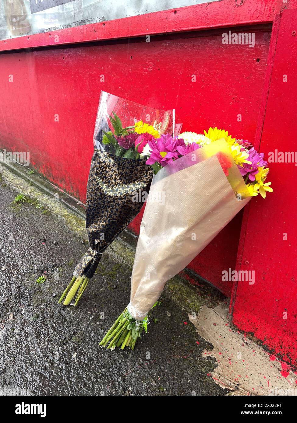 Floral tributes left in Bradford city centre after a 25-year-old man was arrested on suspicion of the murder of 27-year-old Kulsuma Akter, who was stabbed to death in the street as she pushed her baby in a pram on Saturday afternoon. The PA news agency understands the man arrested is Habibur Masum, who has been the subject of police appeals since Saturday. Picture date: Tuesday April 9, 2024. Stock Photo
