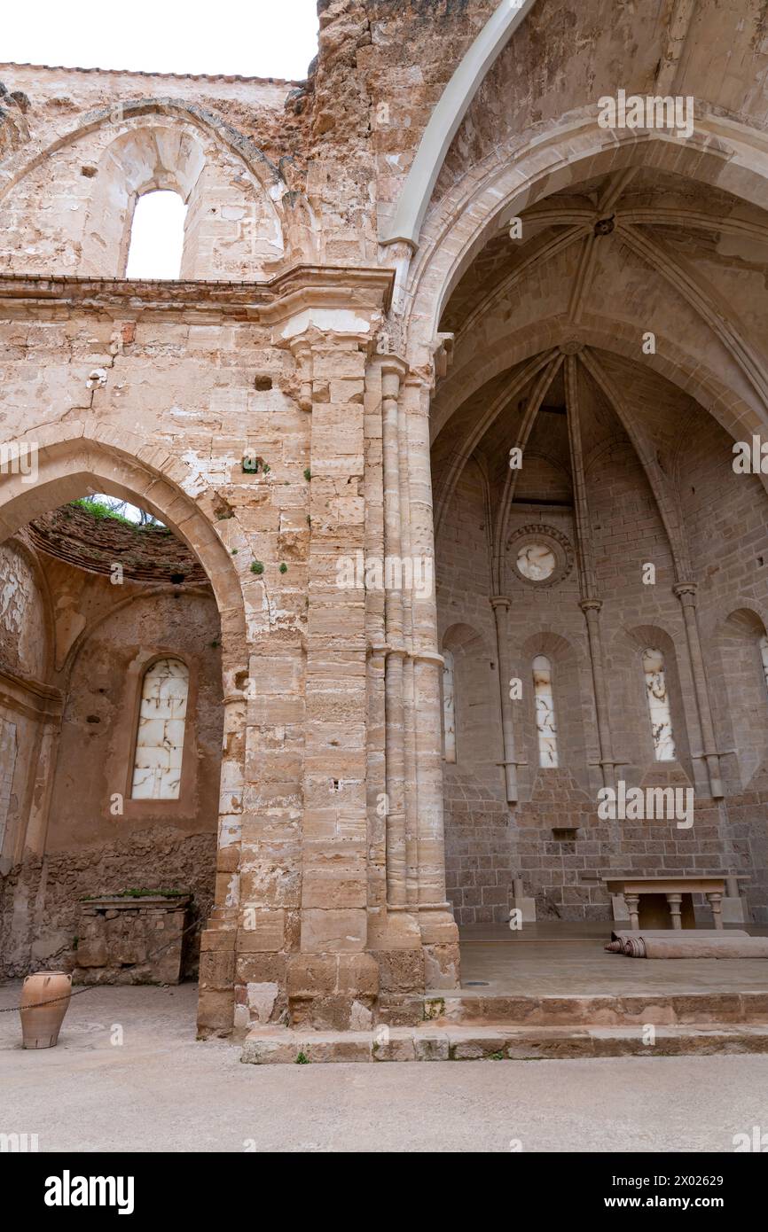 The Gothic apse and remains of an altar in the Monasterio de Piedra, framed by slender columns and lancet windows. Stock Photo