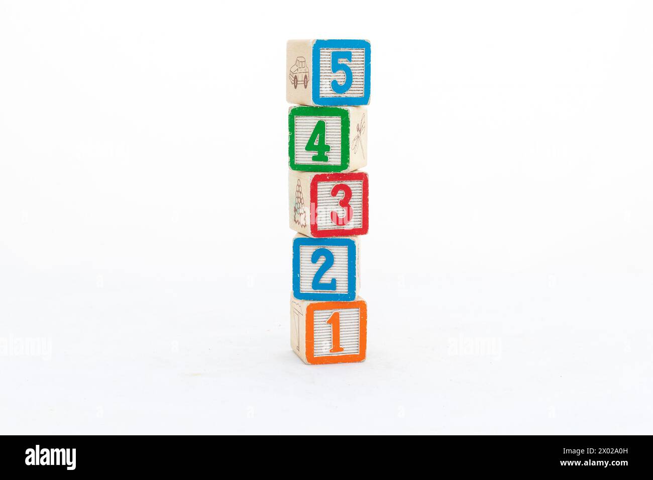 Colorful wooden blocks tower with 5, 4, 3, 2, and 1 numbers isolated on white background Stock Photo