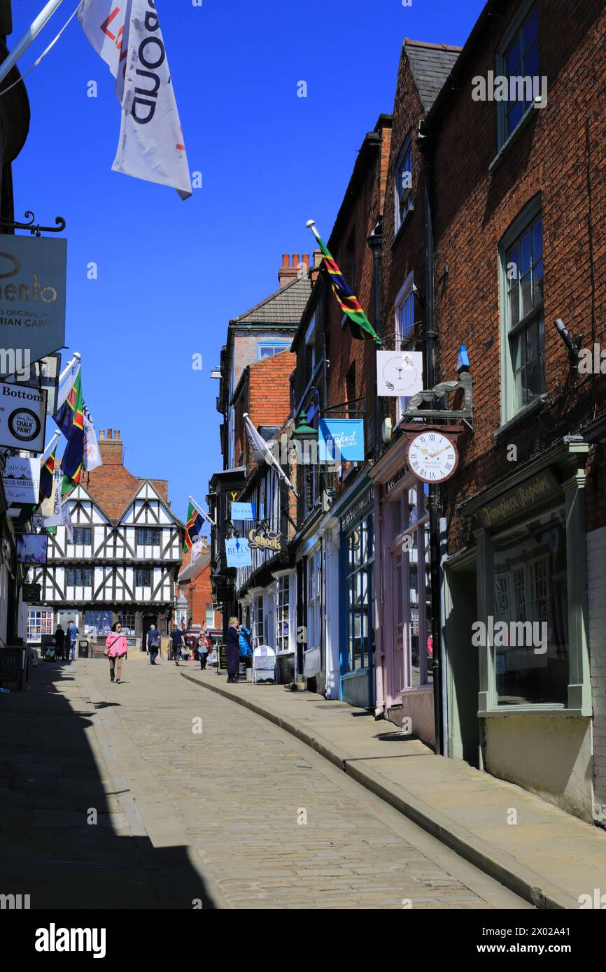 Shops and Cafes along Steep Hill, Lincoln City, Lincolnshire, England, UK Stock Photo