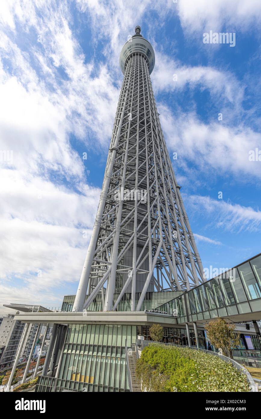 Upward view of the towering tokyo skytree, a landmark against a dramatic sky Stock Photo