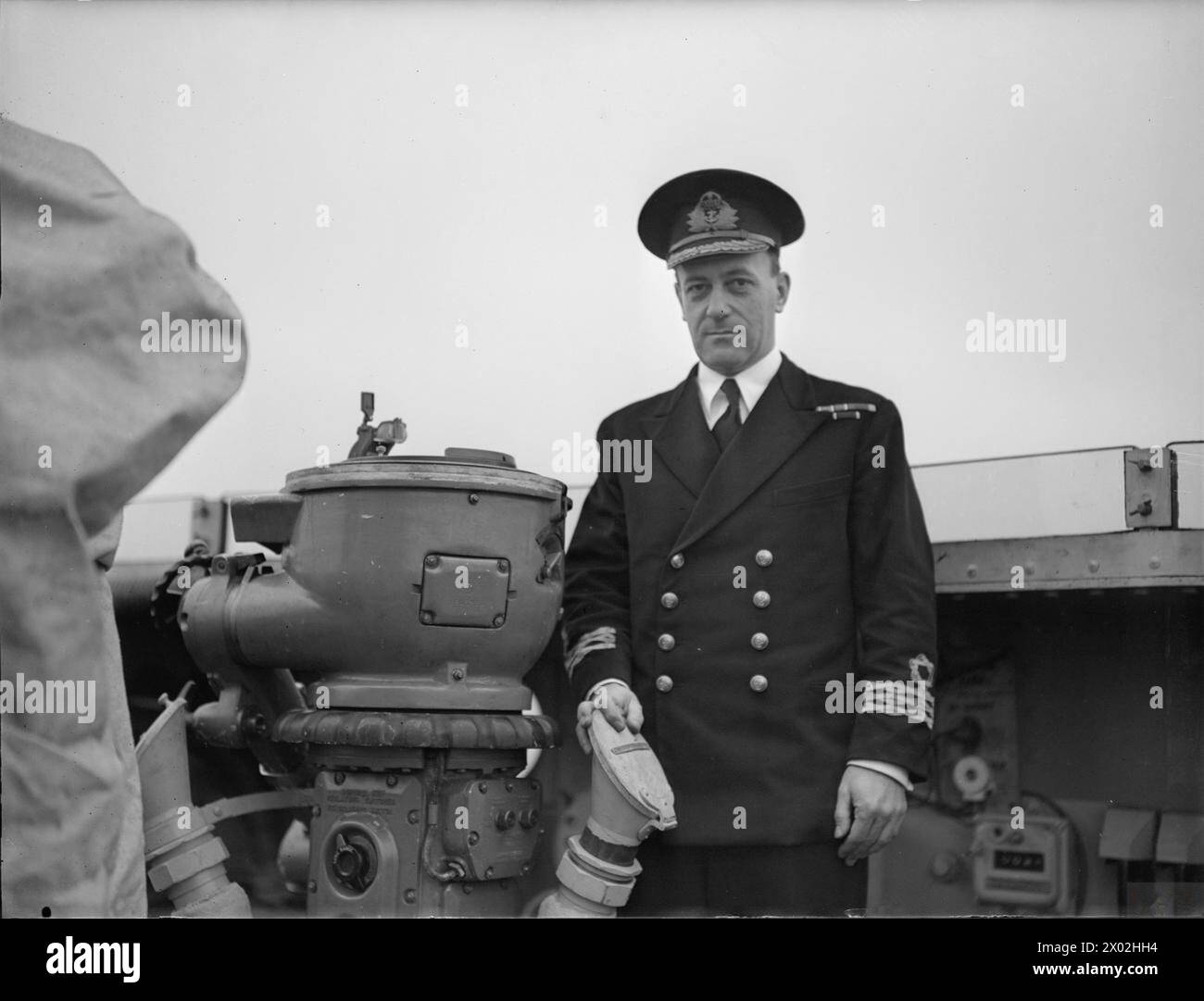 On 4 April 1944 at Greenock, Commander H L Pryse RD RNR is pictured on ...