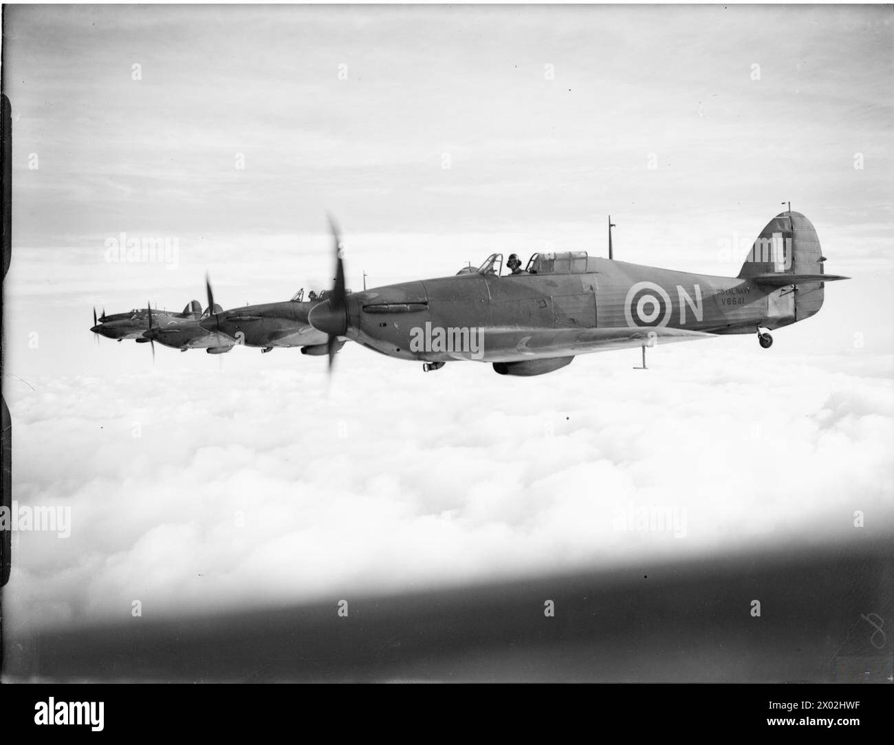 THE ROYAL NAVY DURING THE SECOND WORLD WAR - Five Fleet Air Arm Hawker Sea Hurricanes operating from Yeovilton, flying in formation  Royal Navy, HERON (HMS) Stock Photo