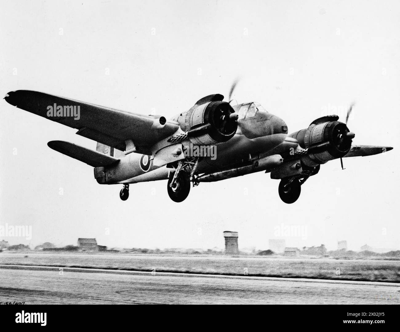 AIRCRAFT OF THE ROYAL AIR FORCE, 1939-1945: BRISTOL TYPE 156 BEAUFIGHTER. - Beaufighter Mark X, LZ114, taking off from from the Bristol Company's aerodrome at Old Mixon near Weston-super-Mare for an engine test, carrying a Mark XII aerial torpedo. LZ114 was later flown operationally by No. 211 Squadron RAF, with whom it went missing during an attack on bridges in Burma on 13 January 1944  Royal Air Force, Maintenance Unit, 211 Stock Photo