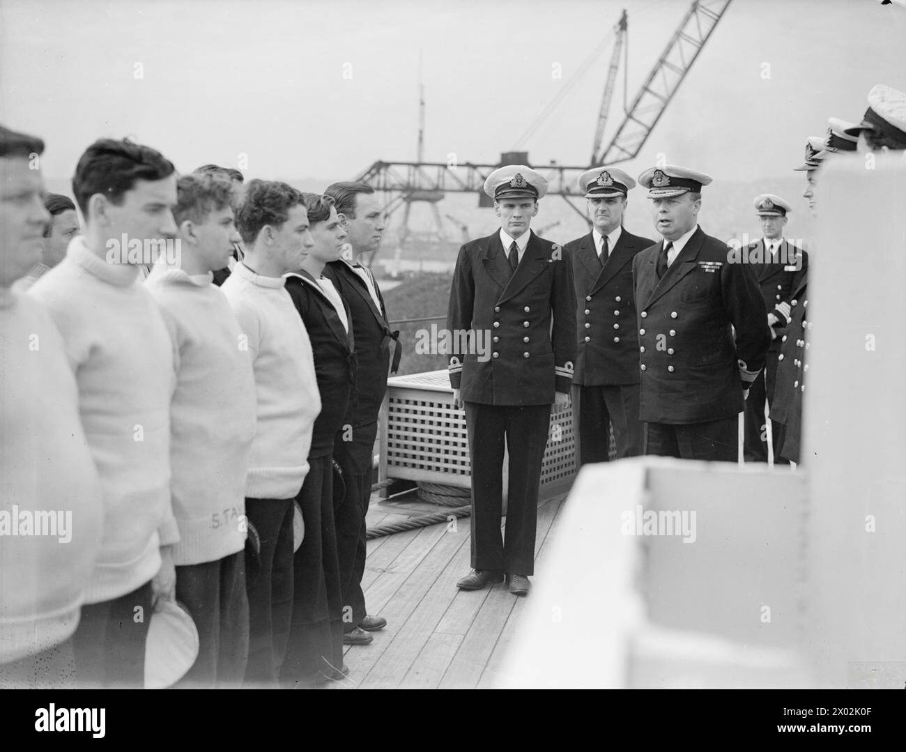 REAR ADMIRAL INSPECTS DIVISIONS ABOARD A SUBMARINE DEPOT SHIP. 4 APRIL ...