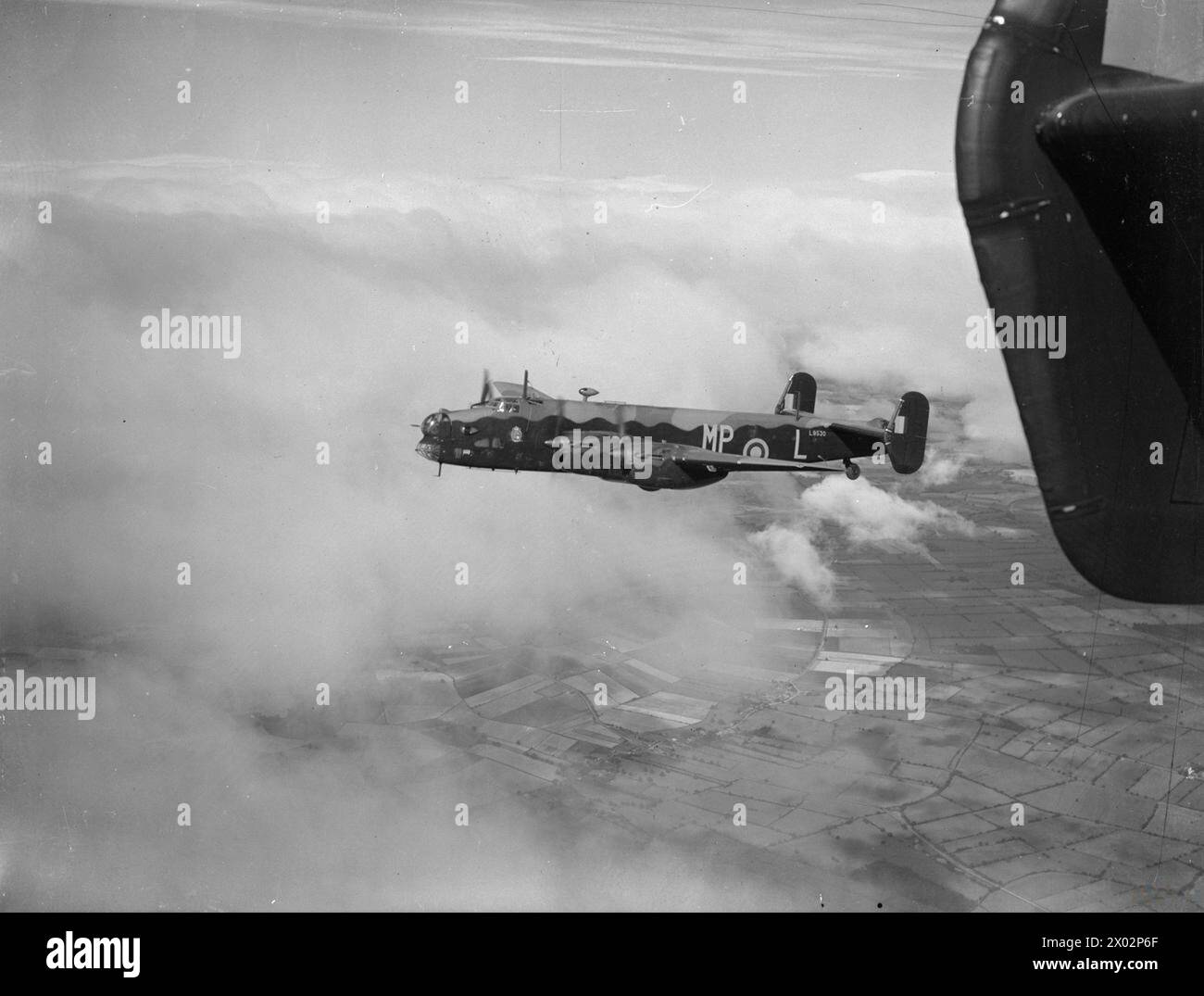 AIRCRAFT OF THE ROYAL AIR FORCE 1939-1945: HANDLEY PAGE HP.57 HALIFAX. - Halifax Mark I Series 1, L9530 MP-L, of No 76 Squadron RAF based at Middleton-St-George, County Durham, in flight  Royal Air Force, Royal Air Force Regiment, Sqdn, 76 Stock Photo