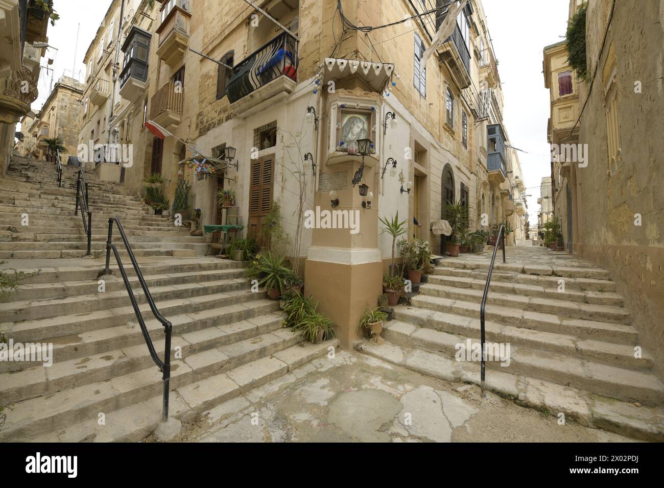 Corner with stairs and picture of the Virgin Mary on a street in Senglea, Malta, Mediterranean, Europe Stock Photo
