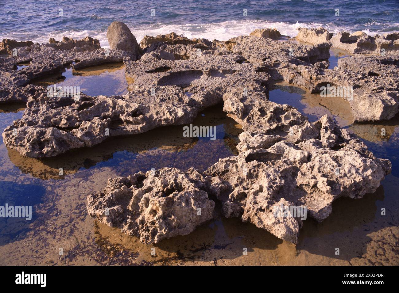 Rocky coast in Bugibba, Malta, Mediterranean, Europe Stock Photo