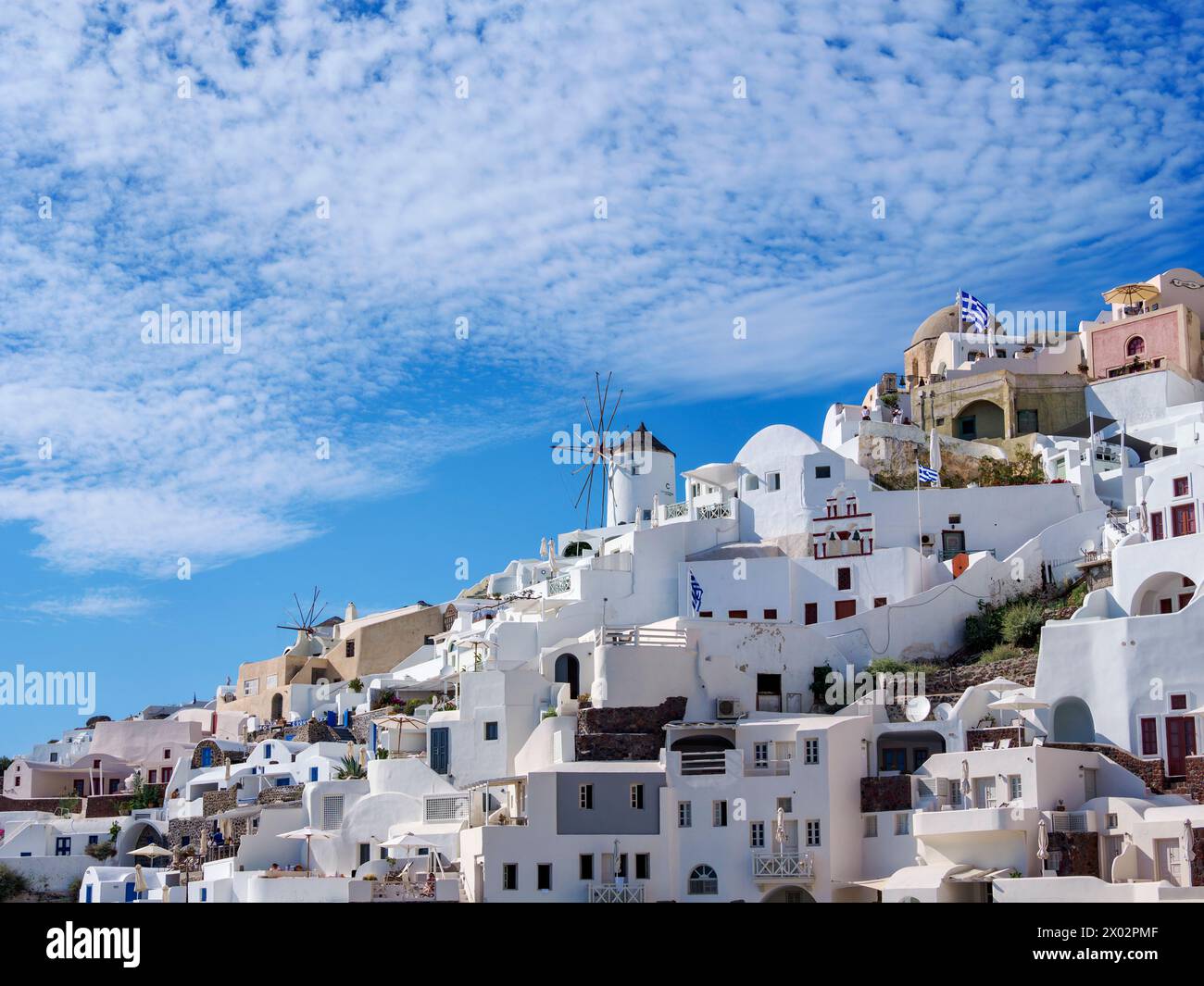 View towards the windmills, Oia Village, Santorini (Thira) Island, Cyclades, Greek Islands, Greece, Europe Stock Photo