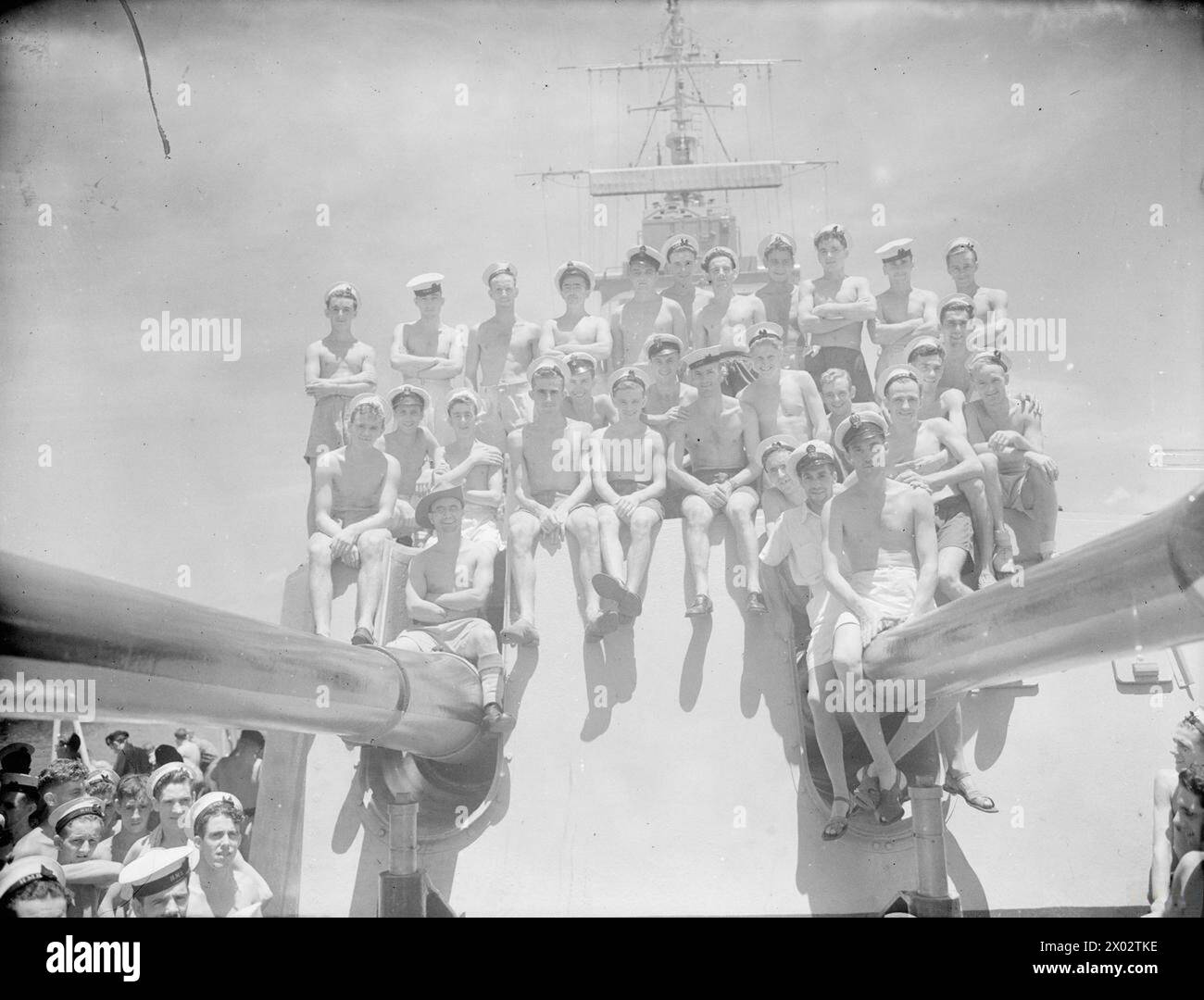 MEN OF HMS CEYLON. 30 SEPTEMBER 1945, COLOMBO, ON BOARD HMS CEYLON THE DAY BEFORE SHE SAILED FOR HOME AT THE END OF HER COMMISSION WITH THE BRITISH EAST INDIES FLEET. THE MEN ARE GROUPED BY AREA. - Yorkshire interest. Includes: Petty Officer R B Bailey, Sheffield; Able Seaman W W Halten, Sheffield; Able Seaman E P Jenkinson, Sheffield; Able Seaman W Lidster, Sheffield; ERA R W Winstanley, Sheffield; Leading Seaman H B Crossley, Sheffield; Able Seaman L S Stamforth, Sheffield; Able Seaman A Dean, Sheffield; Able Seaman C W Gray, Beverley; Petty Officer S H Johnson, Leeds; LSBA T Smith, Leeds; C Stock Photo