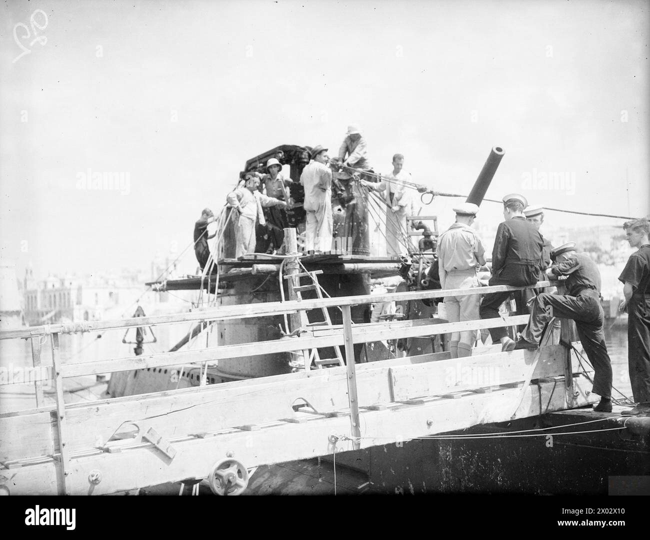 ACTIVITY IN MALTA DOCKYARD. 1924 AUGUST 1942. Damage to the conning