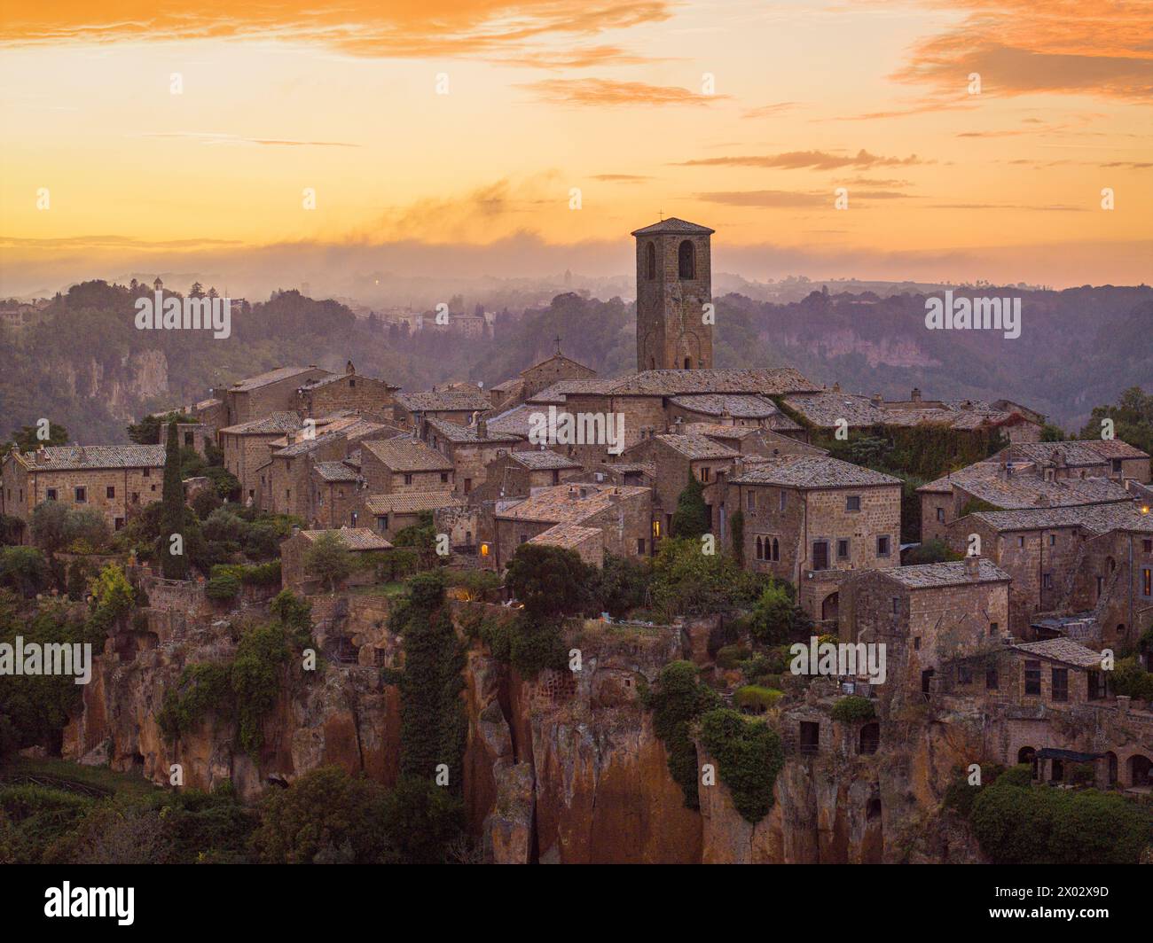 The beautiful village of Civita di Bagnoregio during an autumn sunset, Civita di Bagnoregio, Viterbo, Lazio, Italy, Europe Stock Photo