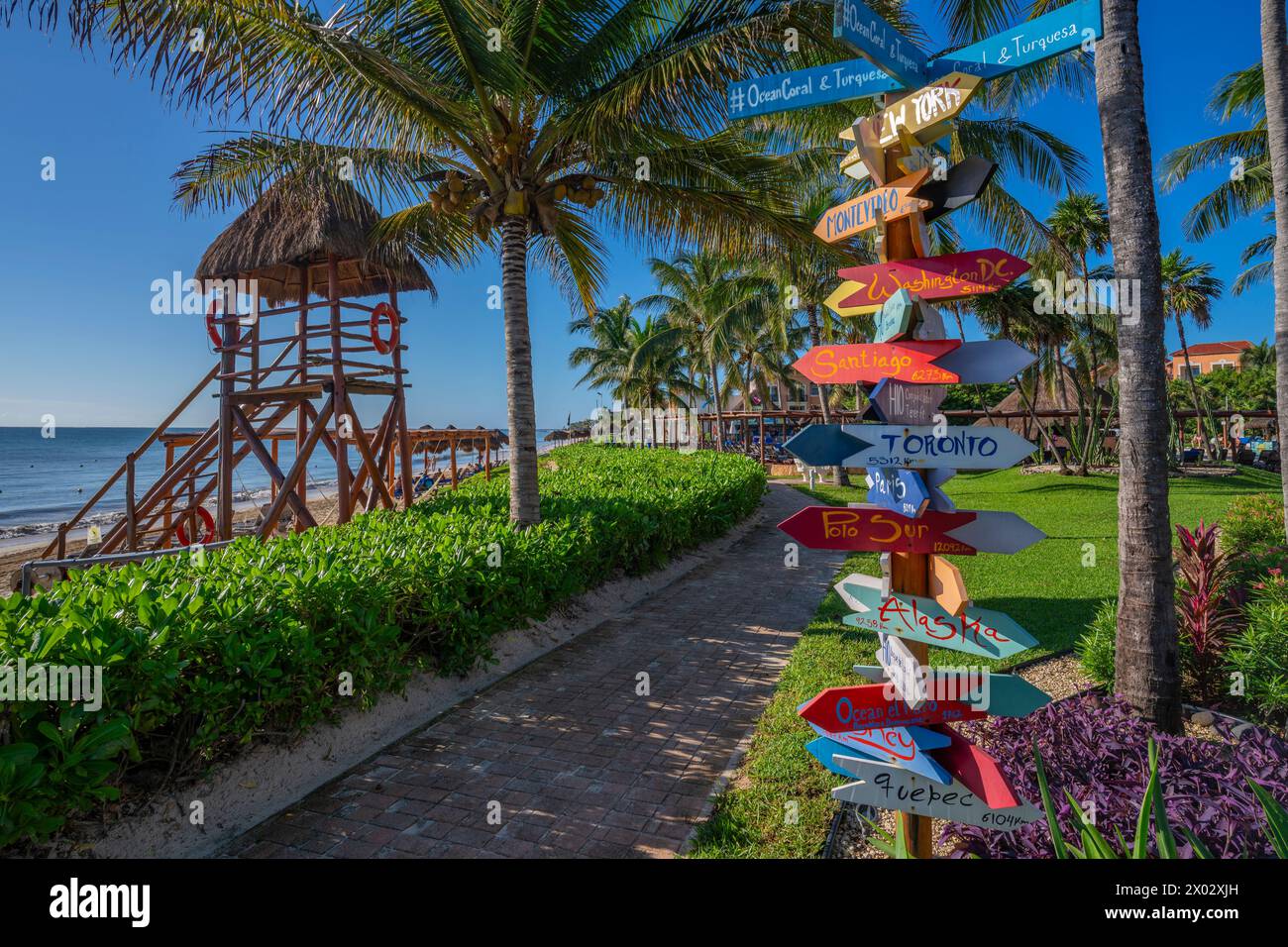 View of colourful hotel destination signpost near Puerto Morelos, Caribbean Coast, Yucatan Peninsula, Mexico, North America Stock Photo