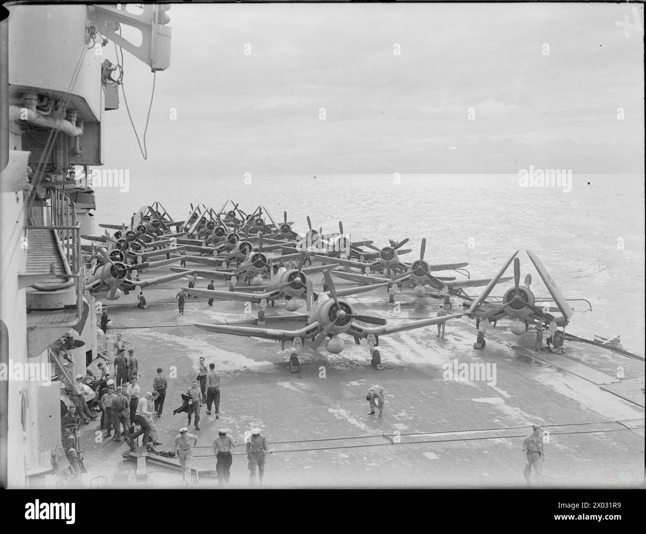 THE ROYAL NAVY DURING THE SECOND WORLD WAR - Chance Vought Corsairs of 1834 and 1836 Squadrons, Fleet Air Arm fitted with extra petrol tanks and ranged ready for attack on the carrier's flight deck on board HMS VICTORIOUS during the carrier-borne air attack against the Japanese repair and maintenance centre at Sigli, Sumatra  Royal Navy, VICTORIOUS (HMS), aircraft carrier, Royal Navy, Fleet Air Arm, 1836 Naval Air Squadron, Royal Navy, Fleet Air Arm, 1834 Naval Air Squadron Stock Photo