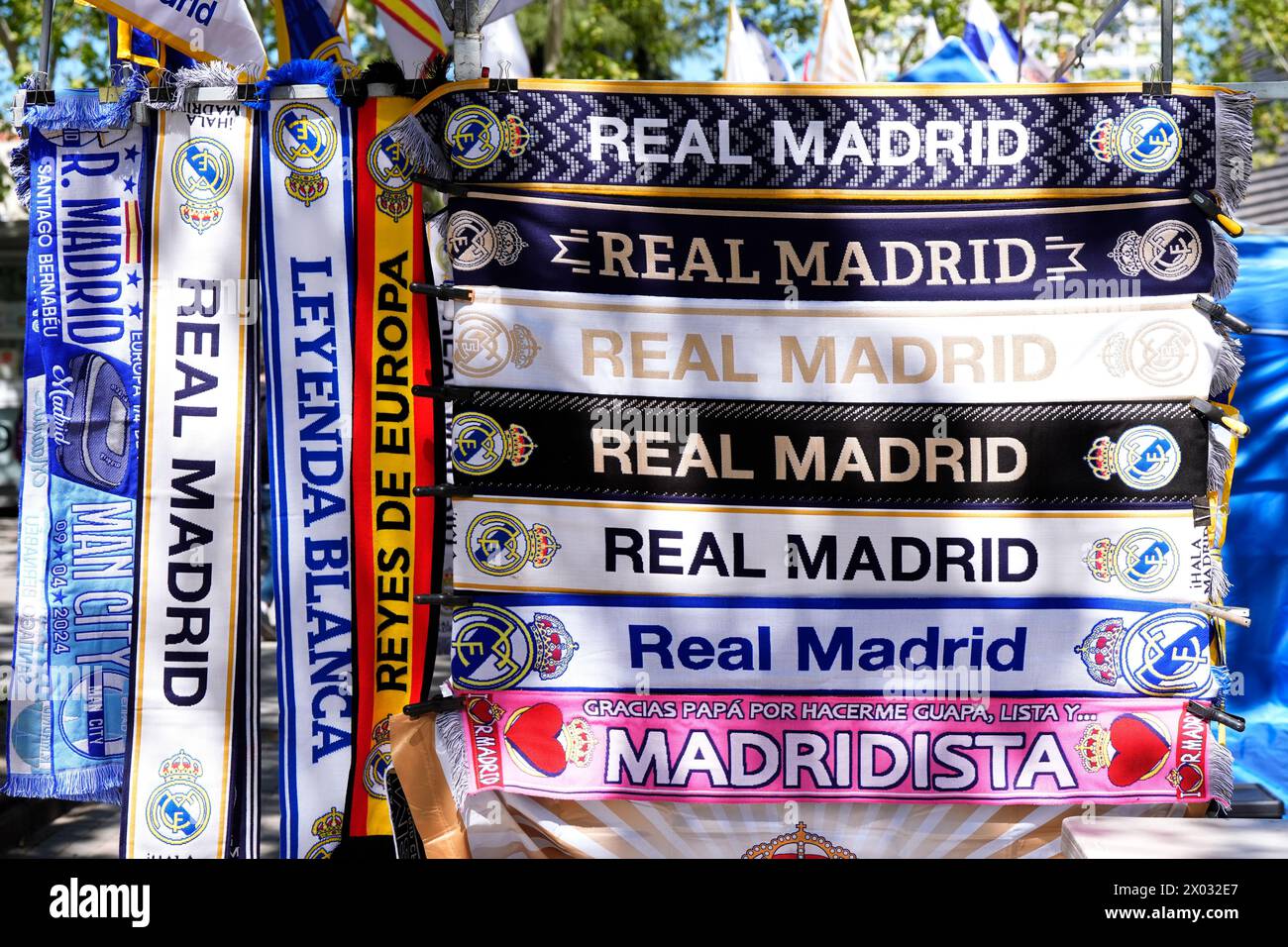 Real Madrid scarves on sale outside the stadium before the UEFA Champions League quarter-final, first leg match at the Santiago Bernabeu Stadium, Madrid. Picture date: Tuesday April 9, 2024. Stock Photo