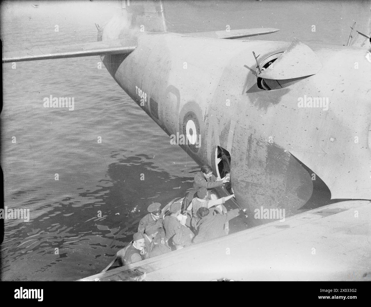 Short Sunderland Mk I, T9048 'DQ-N' of No. 228 Squadron RAF is boarded ...
