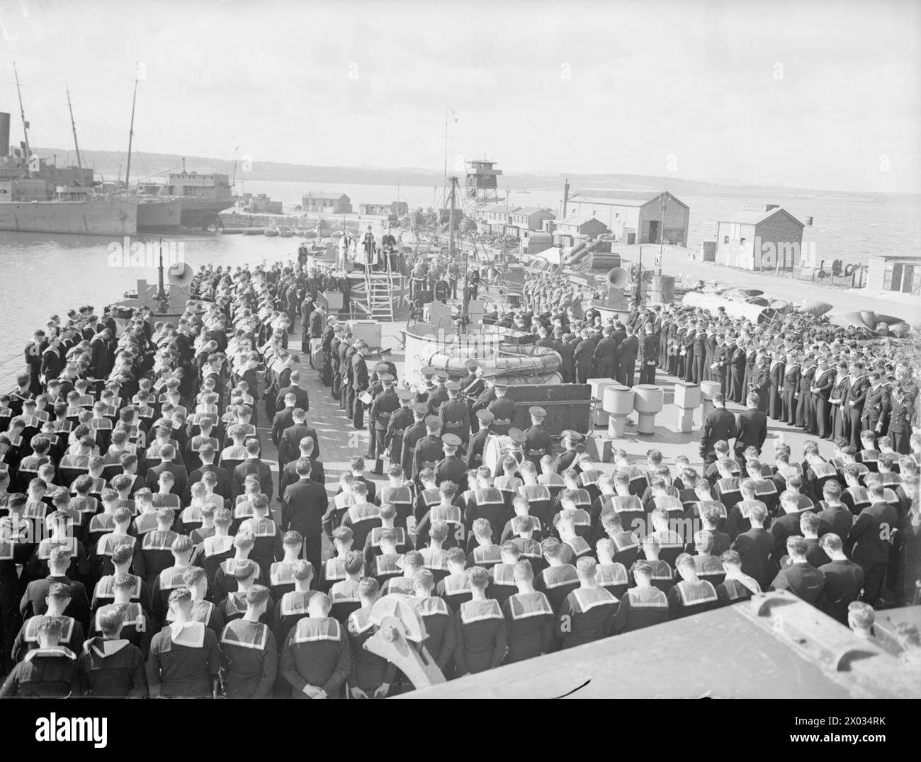 HMS HOWE. AUGUST 1942. The Dedication service on the quarterdeck