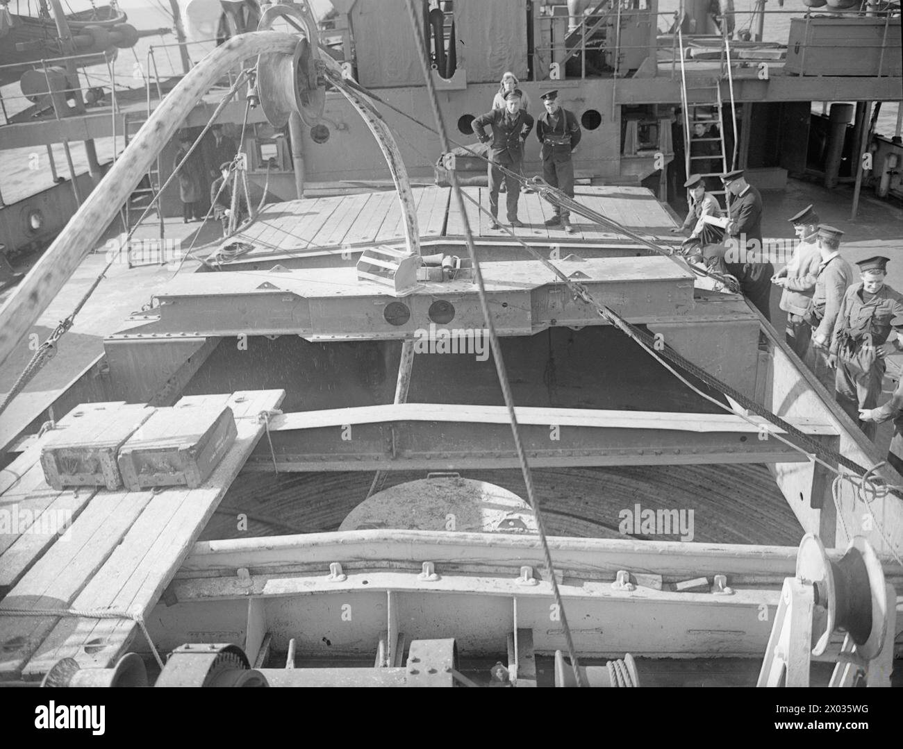 Laying the 17th pluto 24 may 1945 on board the cable laying ship