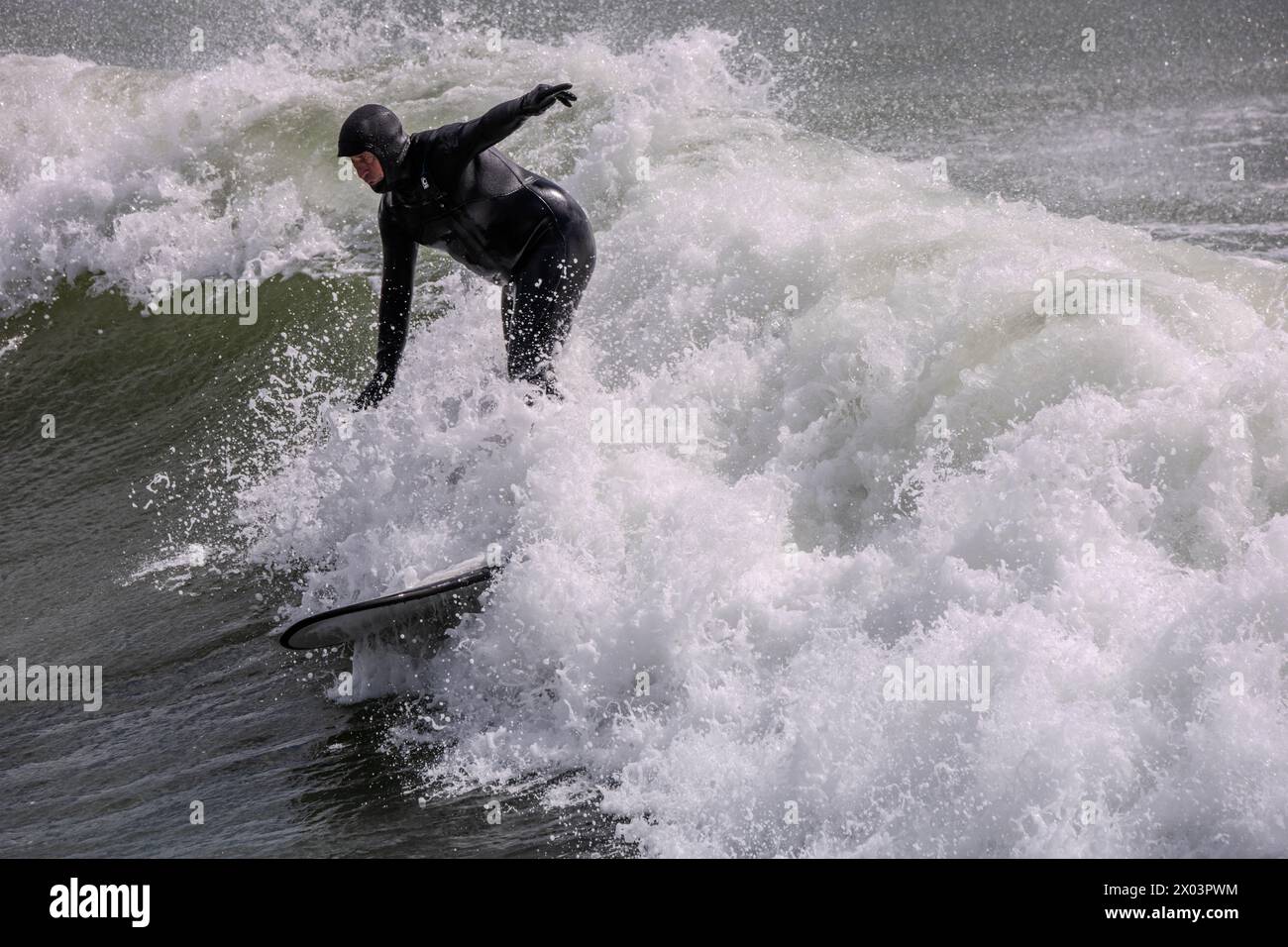 Bournemouth Dorset 9th Apr 2024 UK Weather; visitors enjoy the spring sunshine despite the high winds and large swell from overnight storms. Credit: Ian Davidson/Alamy Live News Stock Photo
