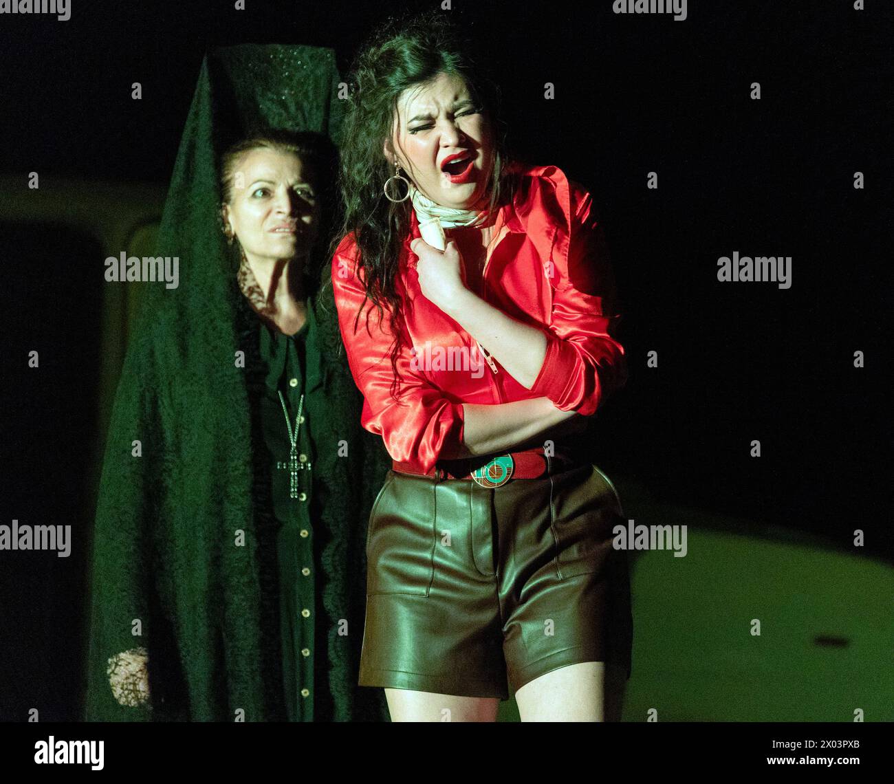 l-r: Ruth Alfie Adams (Mother of Don Jose), Aigul Akhmetshina (Carmen) in CARMEN at the Royal Opera House, Covent Garden, London WC2  05/04/2024 music: Georges Bizet  libretto: Henri Meilhac & Ludovic Halevy  dramaturg: Elisa Zaninotto  conductor: Antonello Manacorda  set design: Paulo Fantin  costumes: Carla Teti  lighting: Alessandro Carletti  director: Damiano Michieletto Stock Photo