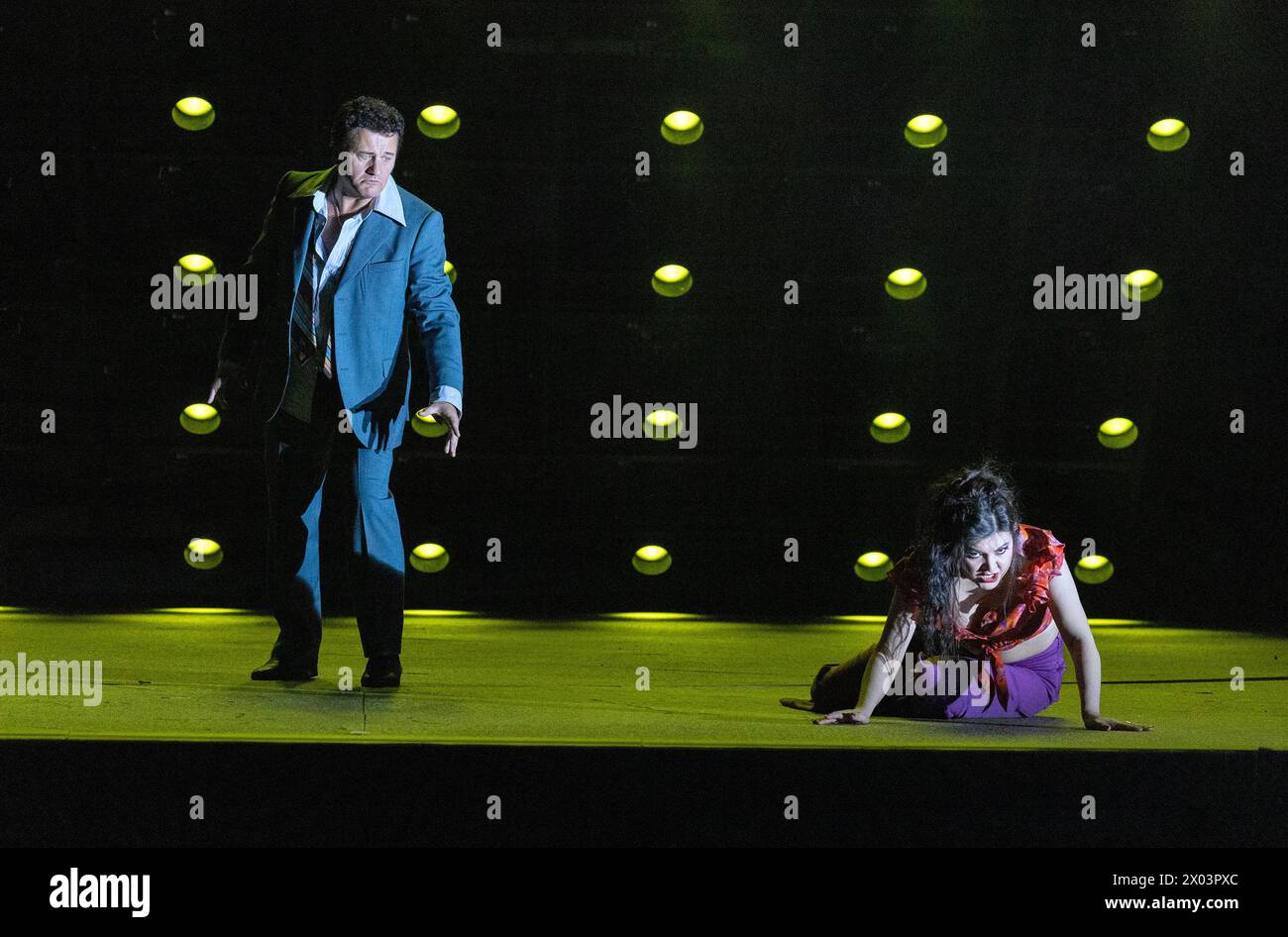 Piotr Beczala (Don Jose), Aigul Akhmetshina (Carmen) in CARMEN at the Royal Opera House, Covent Garden, London WC2  05/04/2024 music: Georges Bizet  libretto: Henri Meilhac & Ludovic Halevy  dramaturg: Elisa Zaninotto  conductor: Antonello Manacorda  set design: Paulo Fantin  costumes: Carla Teti  lighting: Alessandro Carletti  director: Damiano Michieletto Stock Photo