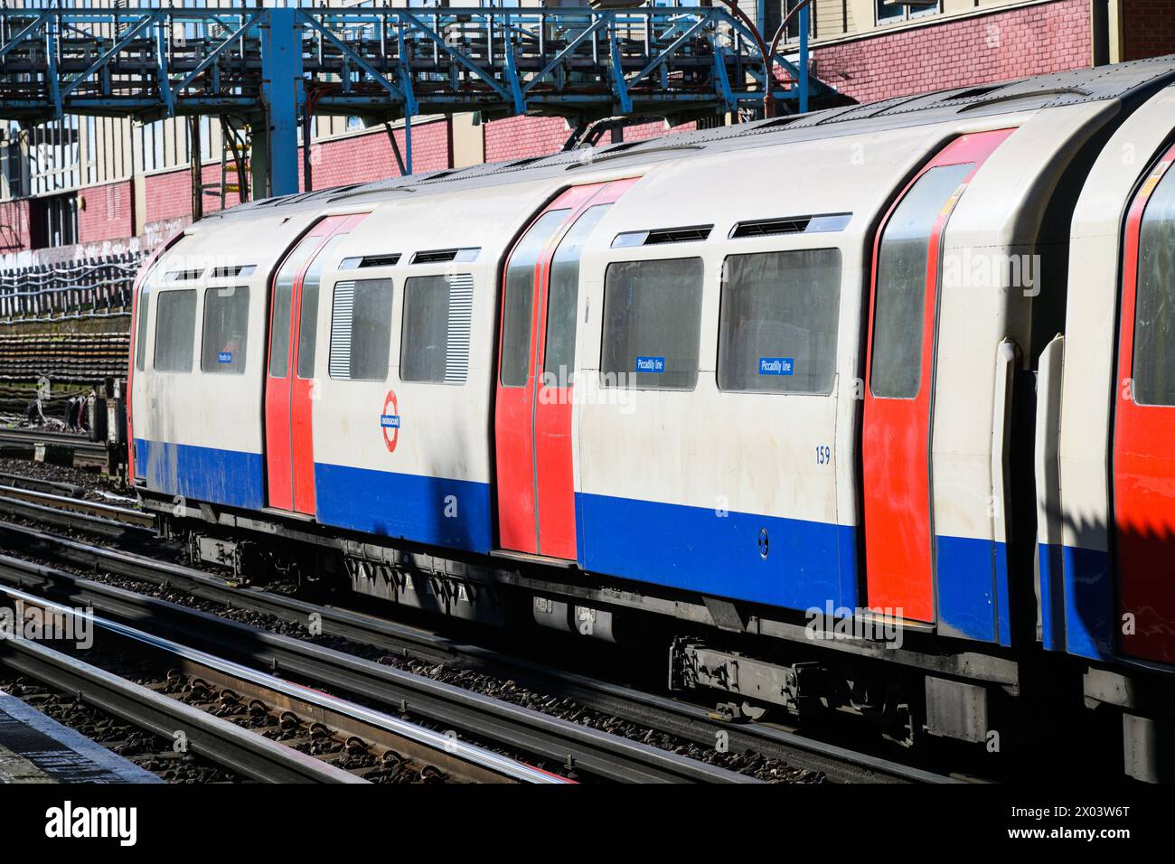 London, UK - March 23, 2024; London underground tube train travelling above ground on the Piccadilly Line Stock Photo