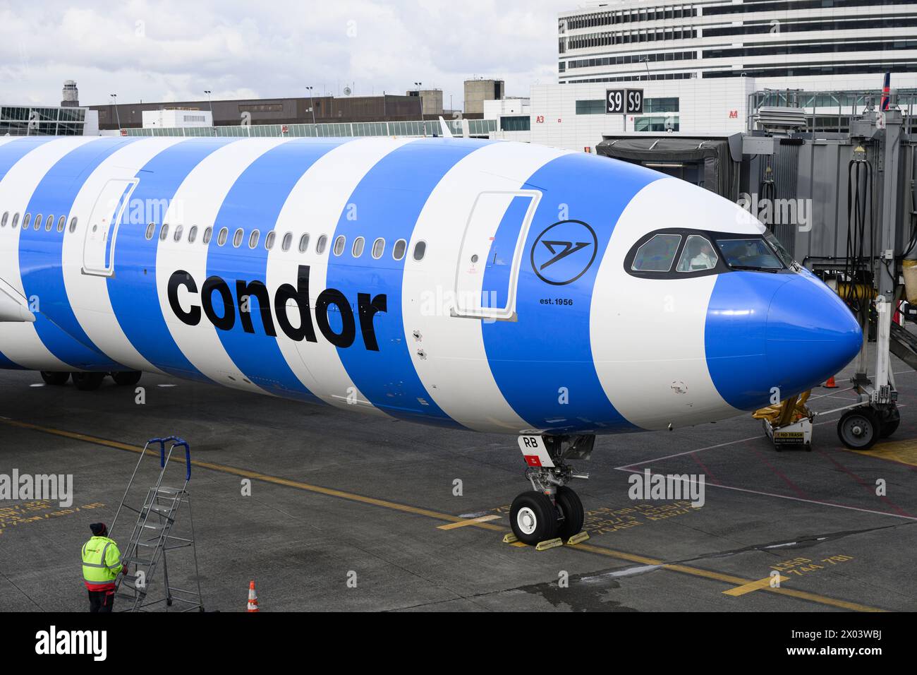 Seatac, WA, USA - March 4, 2024; Condor A330-900 flight at Seatac in blue and white candy striped sea livery Stock Photo