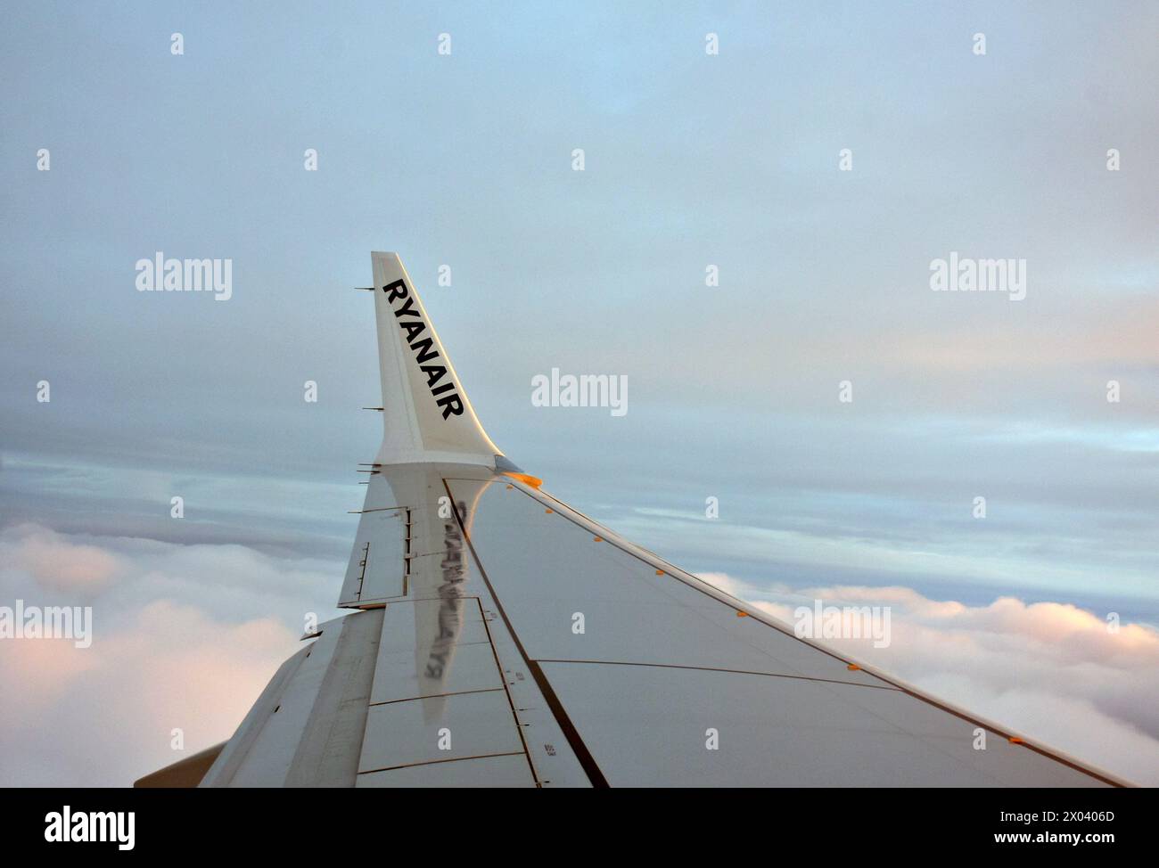 Ryanair Boeing 737-800 series aircraft wing in flight. Stock Photo