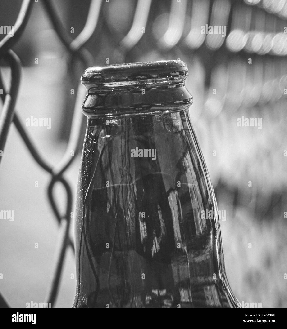 Close up of a bottle in black and white Stock Photo