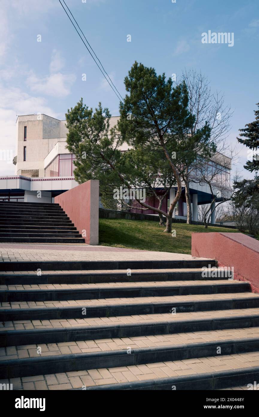 Architecture of a staircase with a building in the background. Tiraspol, a city in Moldava. Patricia Huchot-Boissier / Collectif DyF Stock Photo
