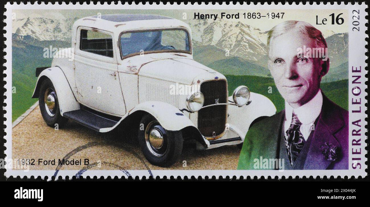 Henry Ford and the model B 0f 1932 on postage stamp Stock Photo