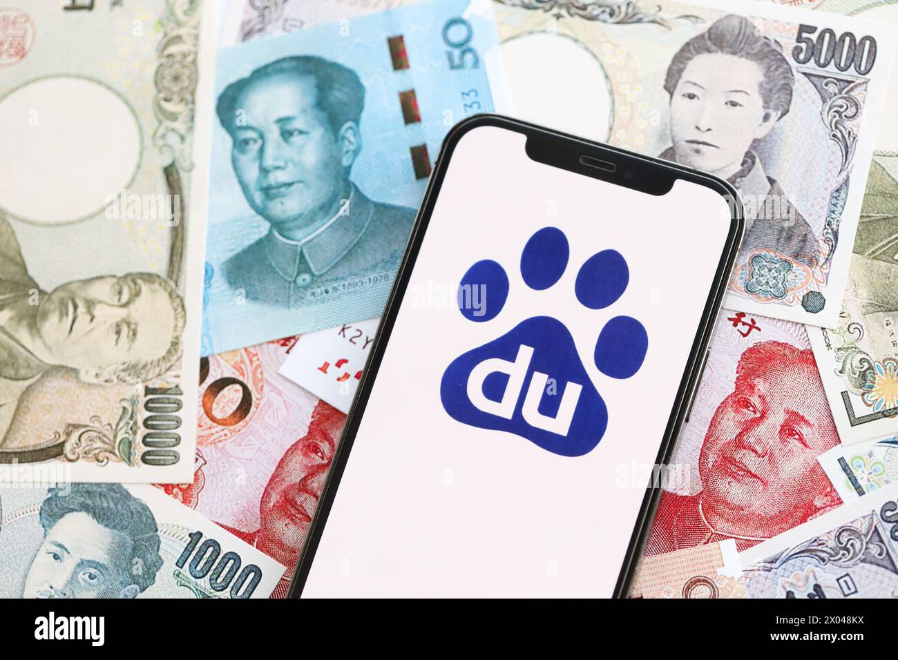 KYIV, UKRAINE - APRIL 1, 2024 Baidu icon on smartphone screen on many ...