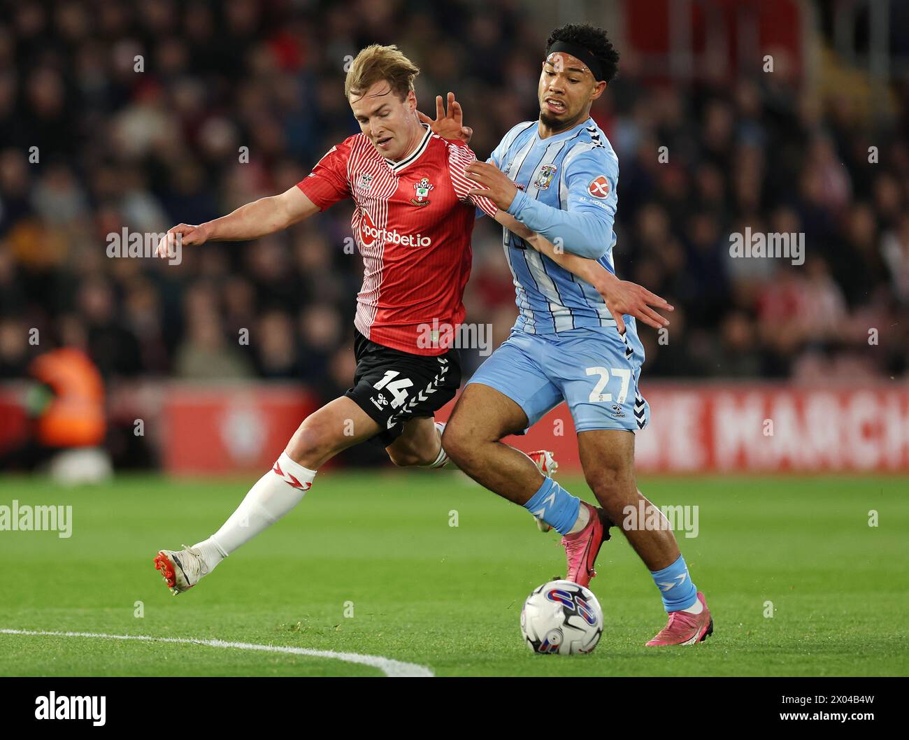 Southampton's James Bree (left) and Coventry City's Milan van Ewijk battle for the ball during the Sky Bet Championship match at St Mary's Stadium, Southampton. Picture date: Tuesday April 9, 2024. Stock Photo