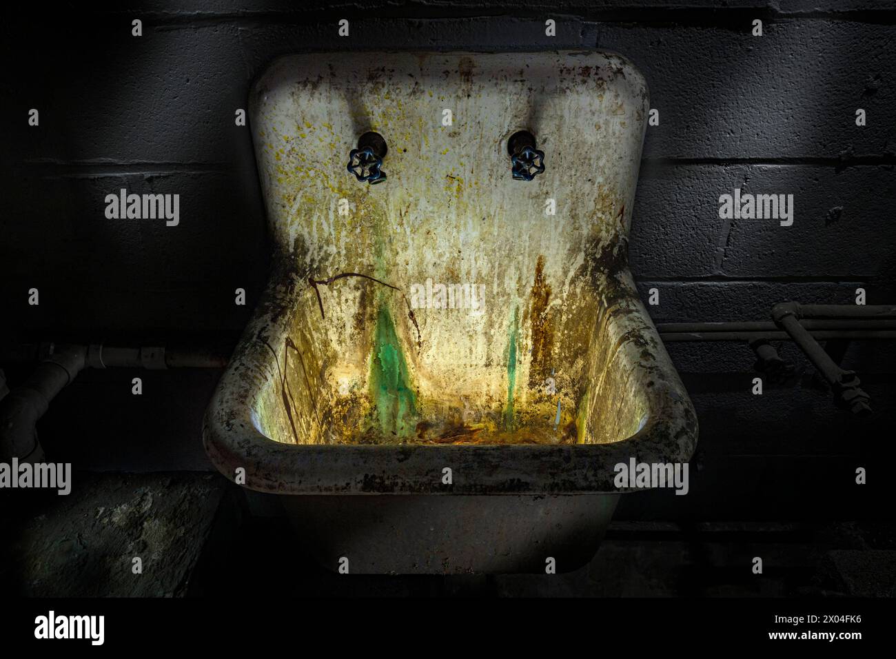 Dirty filthy stained sink Stock Photo