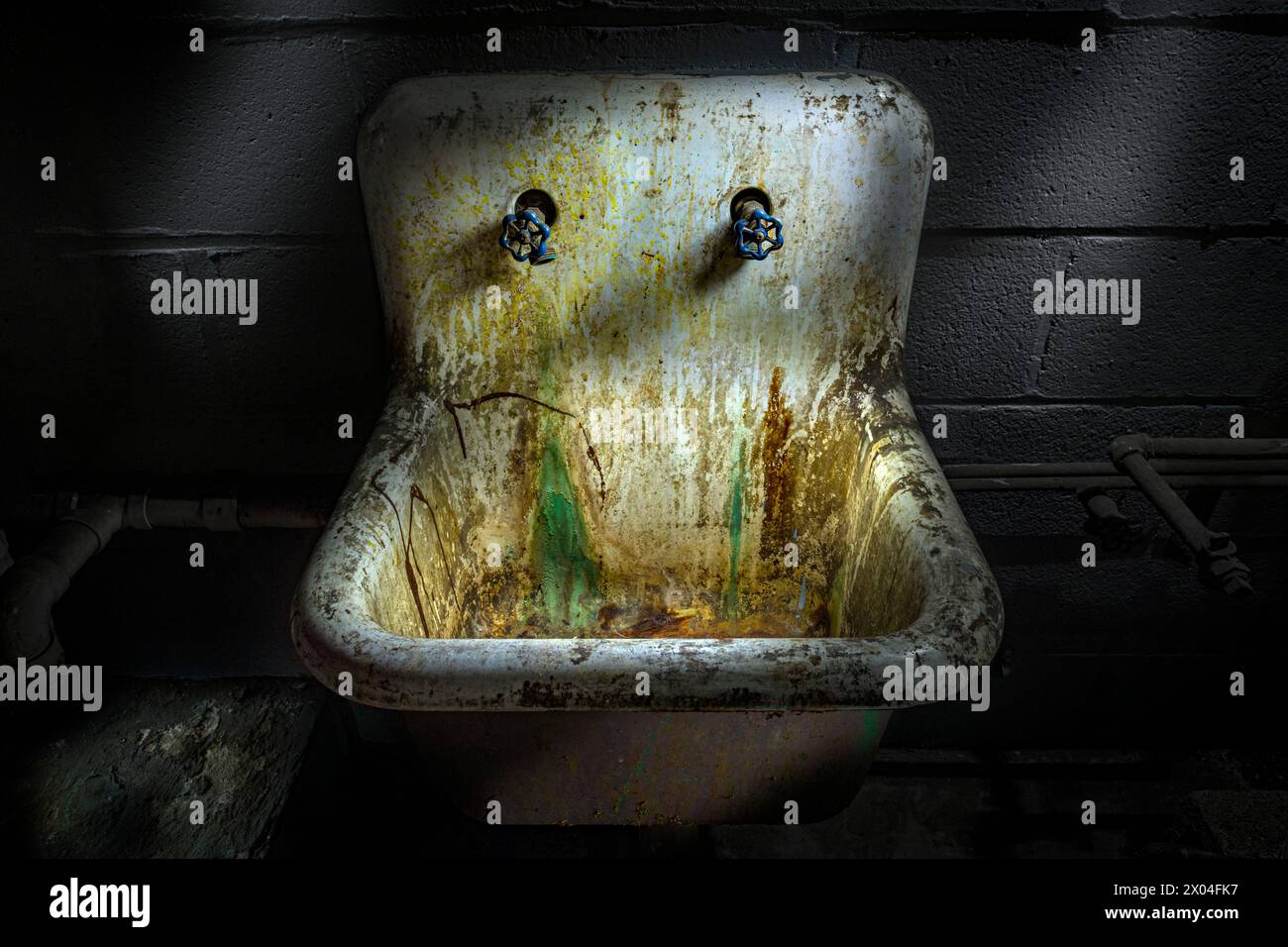 Dirty filthy stained sink Stock Photo