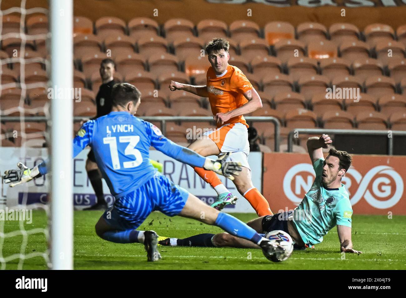 Jake Beesley of Blackpool shoots on goal but its saved by Jay Lynch of Fleetwood Townduring the Sky Bet League 1 match Blackpool vs Fleetwood Town at Bloomfield Road, Blackpool, United Kingdom, 9th April 2024  (Photo by Craig Thomas/News Images) Stock Photo