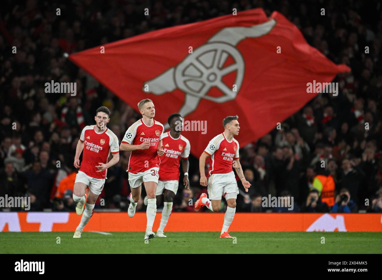 Oleksandr Zinchenko of Arsenal celebrates his teammate Leandro Trossard's goal during the UEFA Champions League Quarter-Final (1st leg) football match between Arsenal FC and Bayern Munich at the Emirates Stadium in London, England. (Will Palmer/SPP/ATP Images) Credit: SPP Sport Press Photo. /Alamy Live News Stock Photo