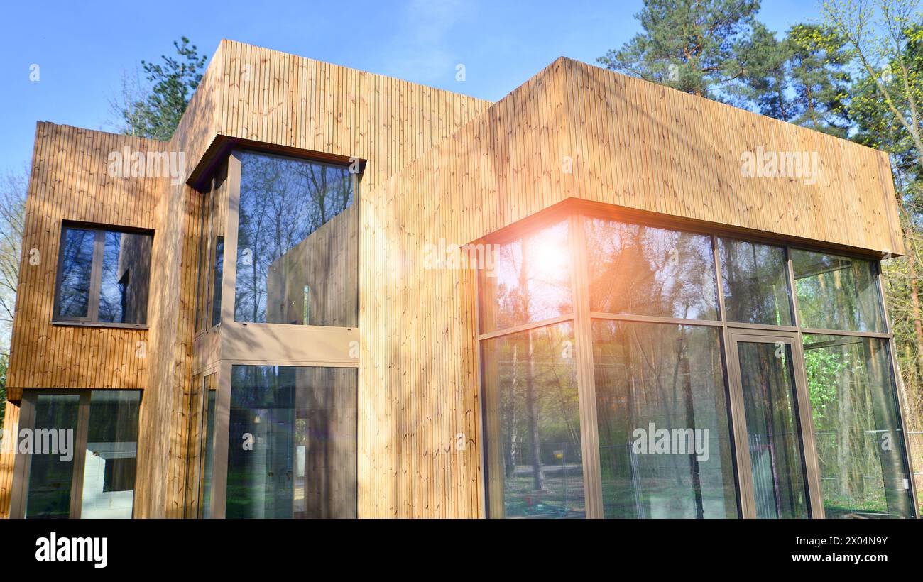 New single family house. Residential home with modern wooden facade ...