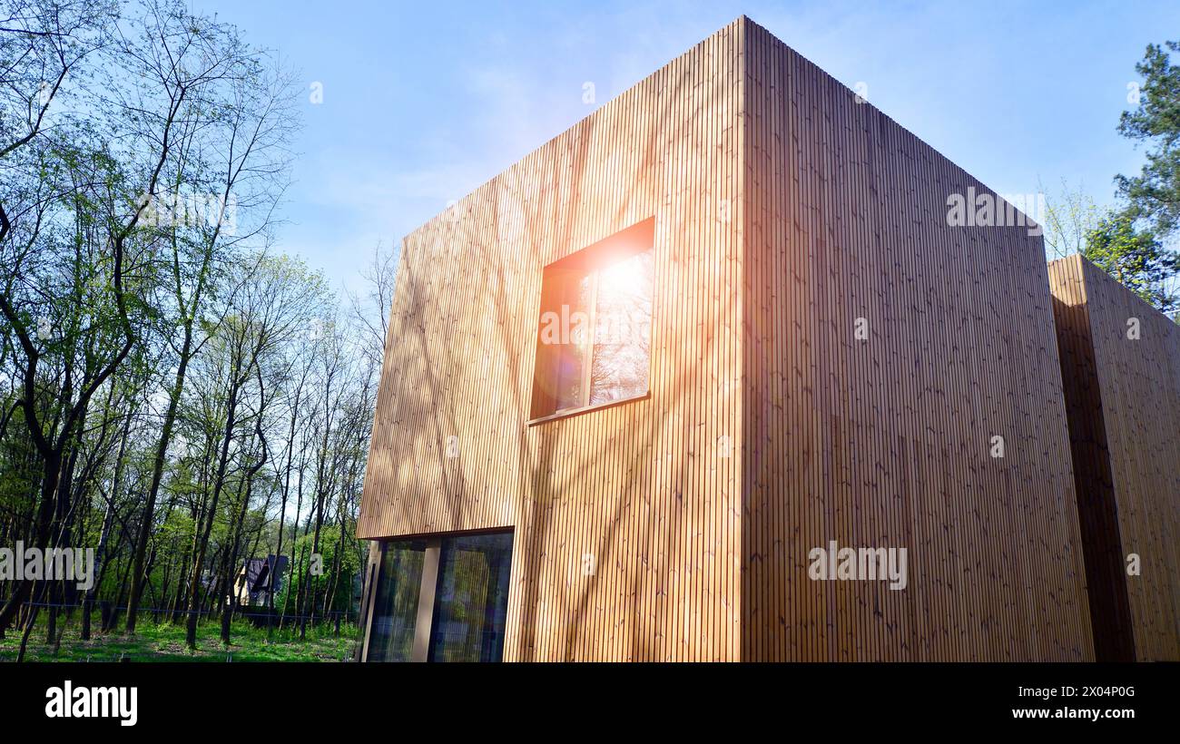 New single family house. Residential home with modern wooden facade ...