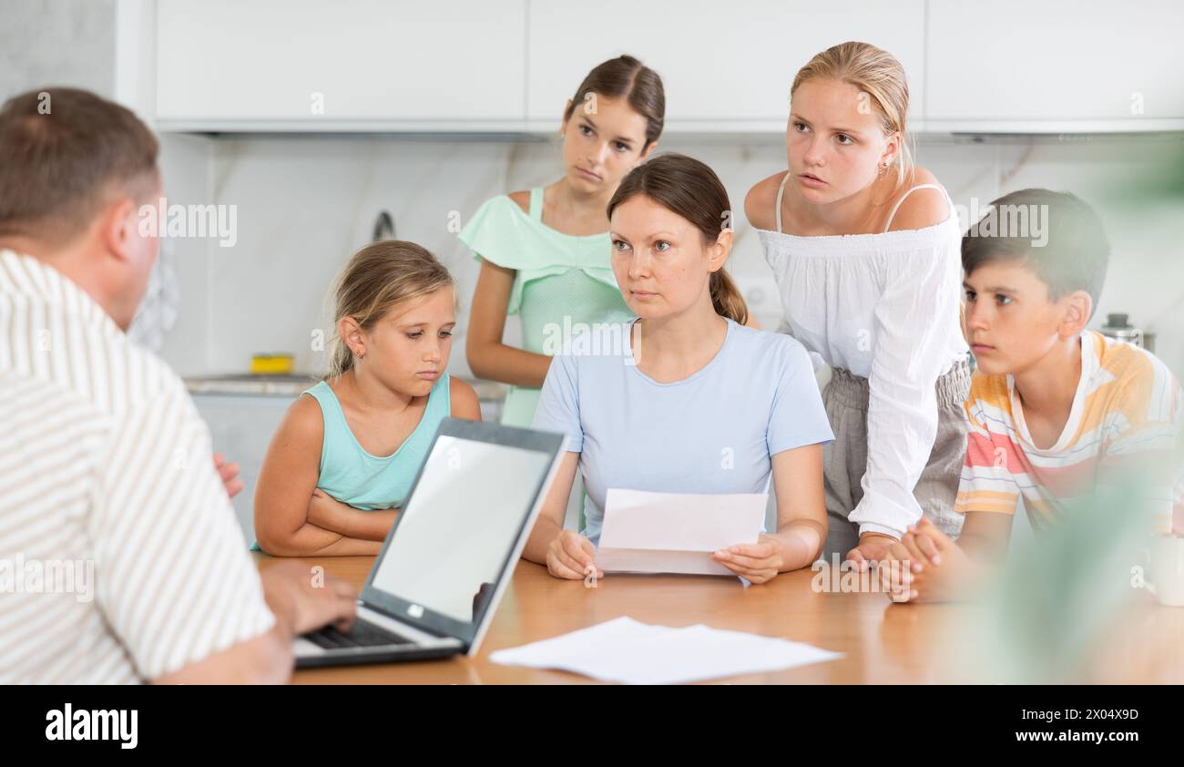Caseworker came with a check to mother of many children. Children are ...