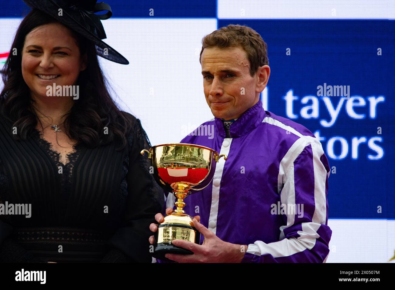 Jockey Ryan Moore collects his trophy after Tower Of London won the Group 2 Dubai Gold Cup, Meydan, Dubai, 30/03/24. Credit KJTW Equine Images / Alamy. Stock Photo