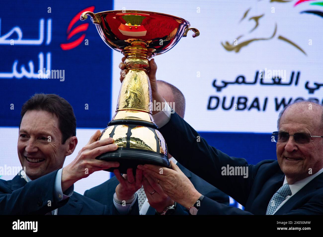 Derrick Smith, Michael Tabor, Mrs John Magnier and Westerberg, lift the Dubai Gold Cup, 30/03/24. Credit JTW Equine Images / Alamy. Stock Photo