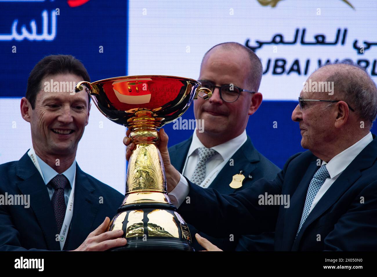 Derrick Smith, Michael Tabor, Mrs John Magnier and Westerberg, lift the Dubai Gold Cup, 30/03/24. Credit JTW Equine Images / Alamy. Stock Photo